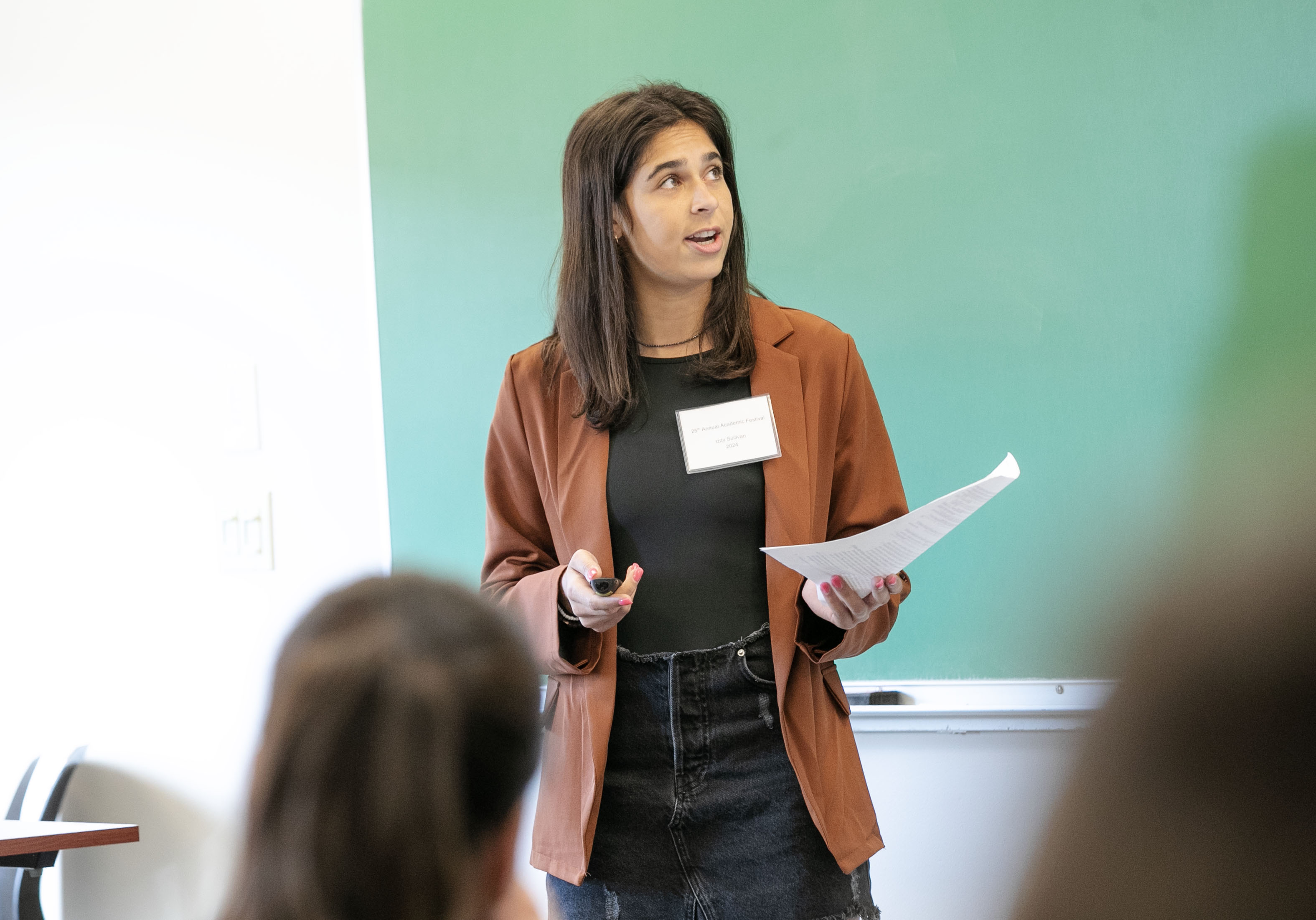 Izzy Sullivan ’24 gives a presentation about her self-determined major in broadcast journalism.