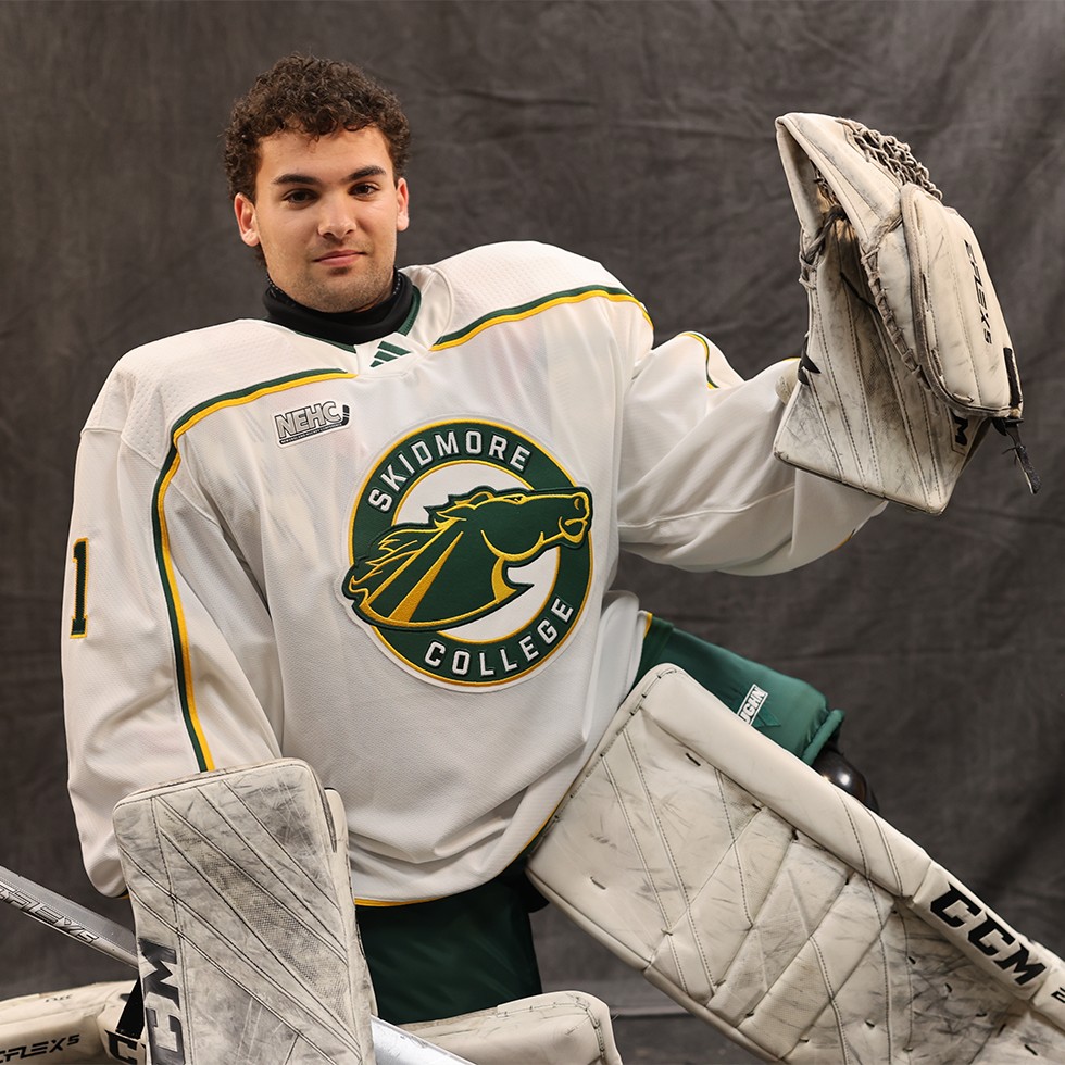 Alex Bonrouhi '27 wearing a Skidmore hockey uniform