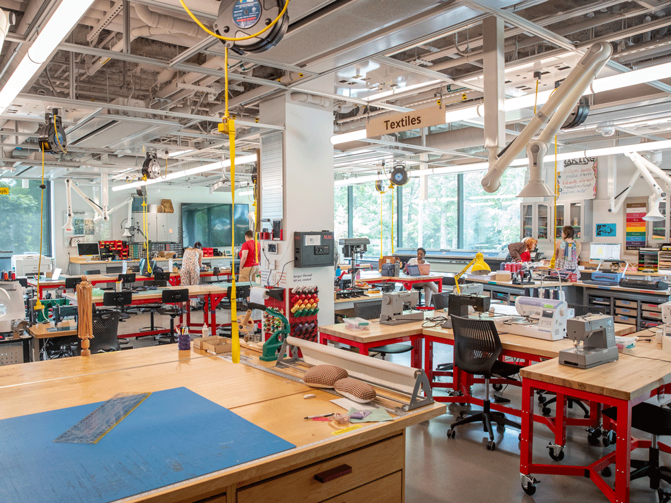 Various red work stations throughout Skidmore's IdeaLab