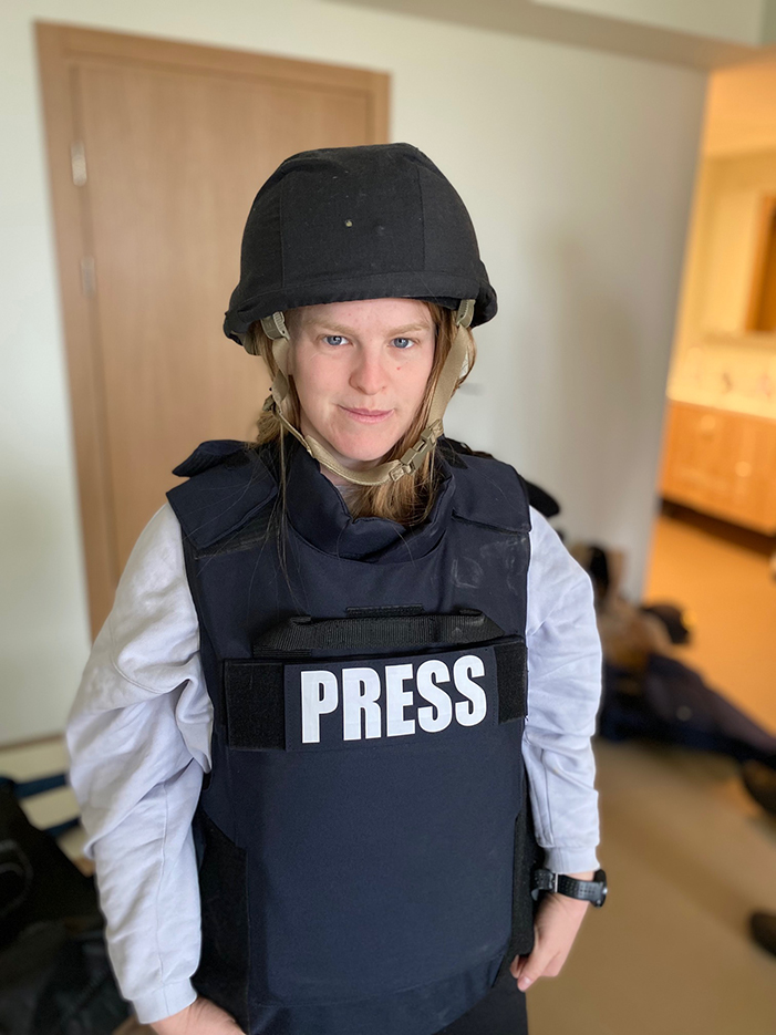 Nadworny wears a flak jacket in Ukraine