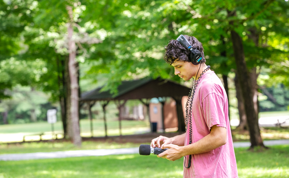 Benjamin Rodis ’25 records audio at Camp Stomping Ground