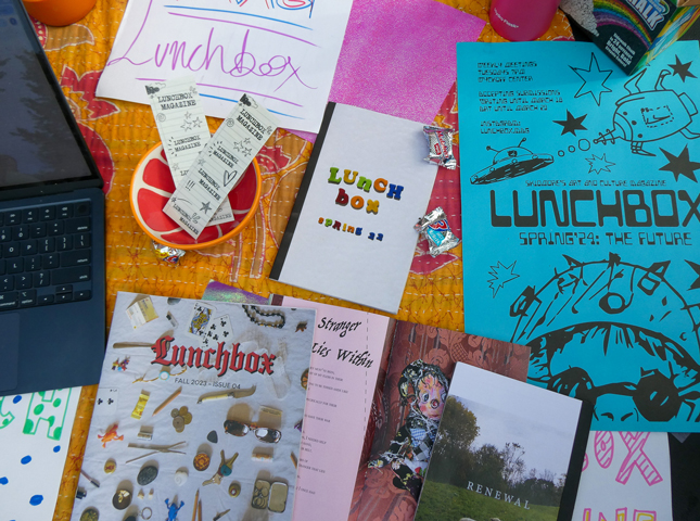Lunchbox Magazine issues and posters displayed during Club Fair