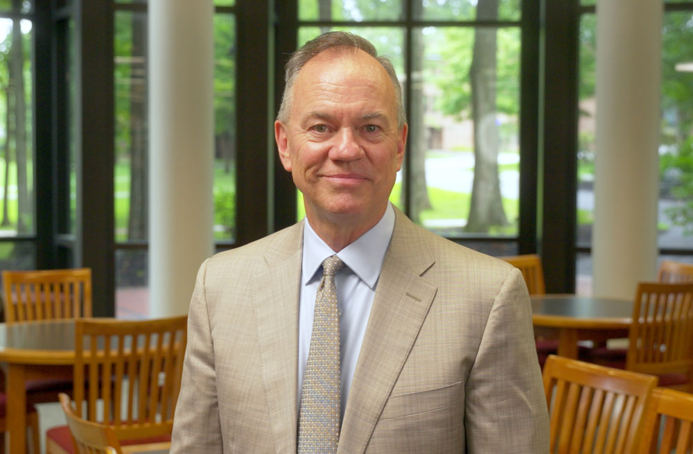 President Marc Conner stands in Scribner Library