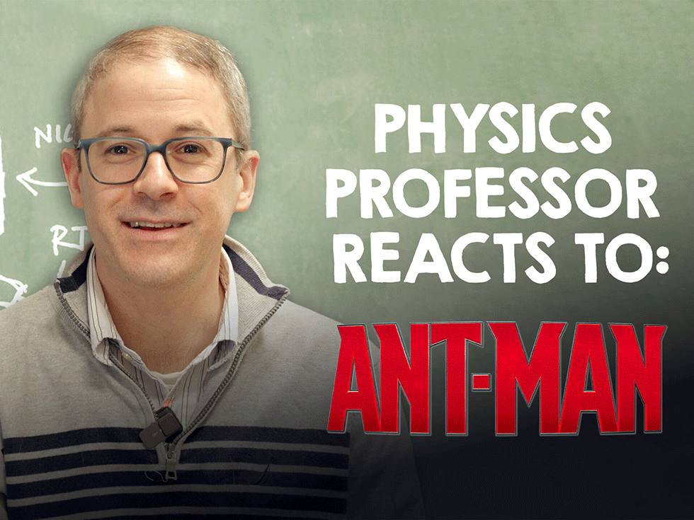 Professor Evan Halstead poses at the beginning of his YouTube video with a green chalkboard in the background