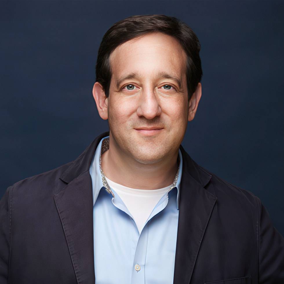 Headshot of David Miner '91 with black background